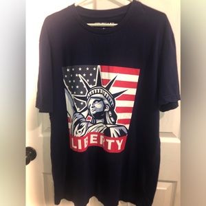 - XL patriotic “ Liberty” with Statue of Liberty,on navy tee shirt in GUC.…